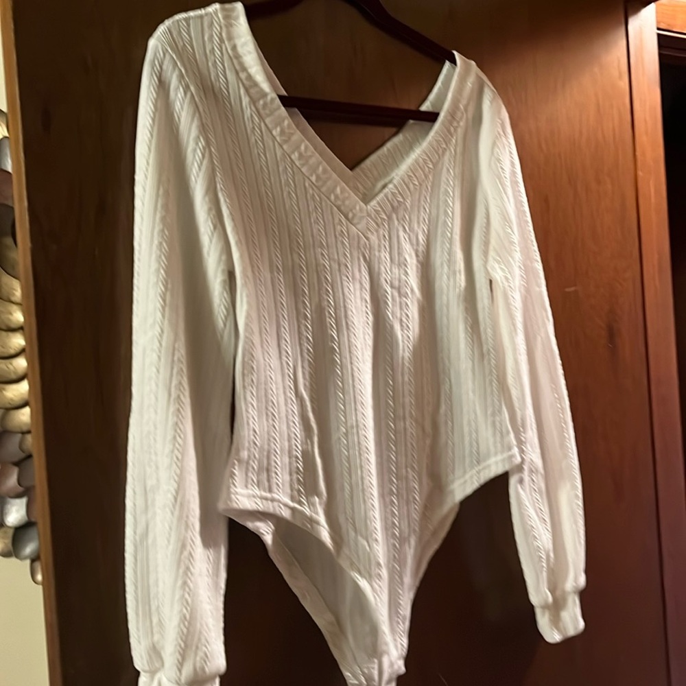 Large V Neck body suit never worn